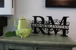 Custom cut wood monograms to display your surname proudly.